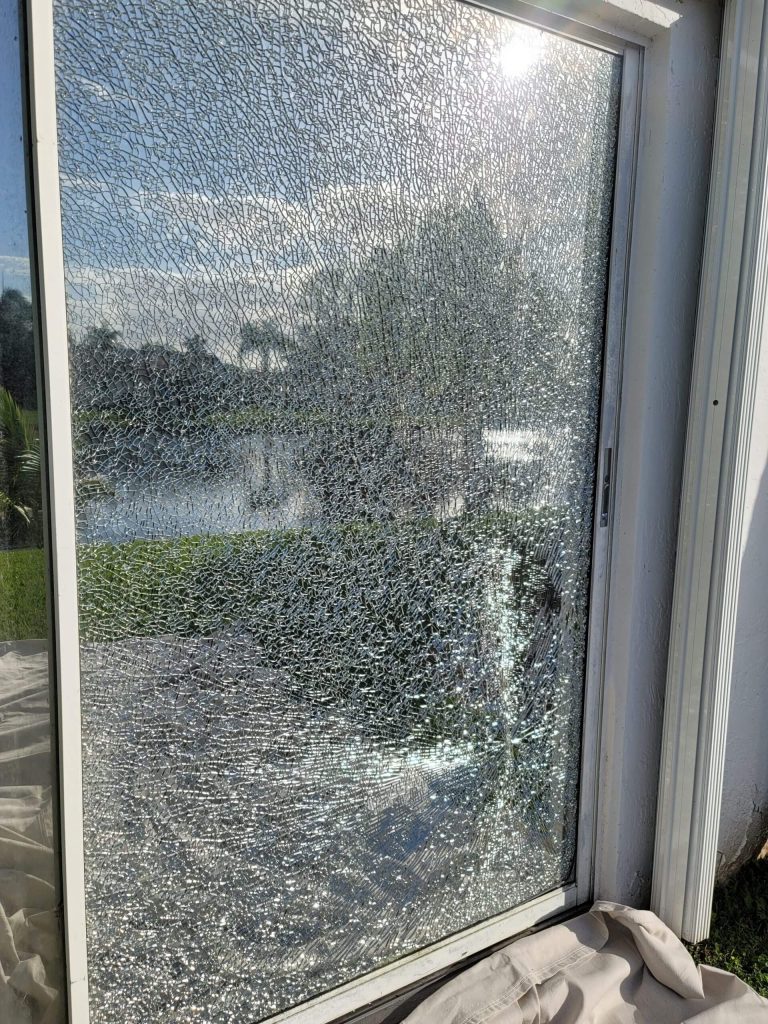 Shattered tempered glass in a sliding glass door