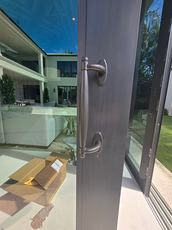 Impact sliding door handle on a discontinued door model
